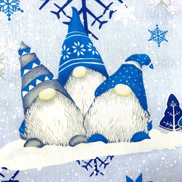 Tessuto di cotone - Gnomi natalizi e fiocchi di neve blu