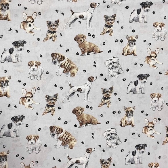 Tessuto di cotone - Zampe di cane su sfondo grigio chiaro