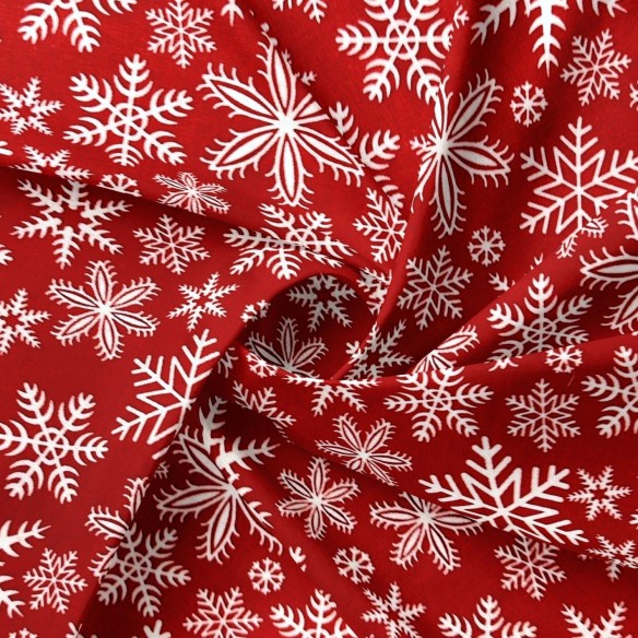 Tessuto di cotone - Fiocchi di neve di Natale rossi