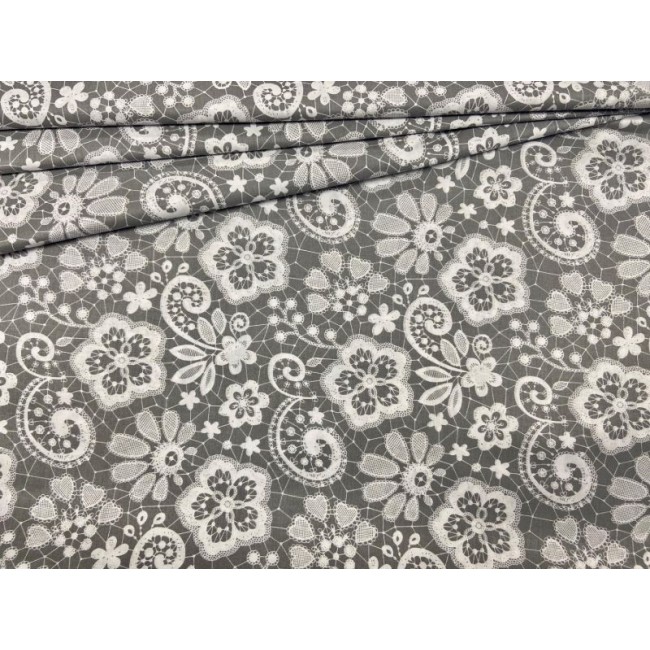 Tessuto di cotone - Grande pizzo bianco su grigio