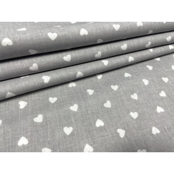 Tessuto di cotone - Piccoli cuori bianchi su grigio