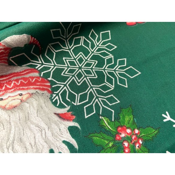 Tessuto di cotone - Babbo Natale e fiocchi di neve su verde