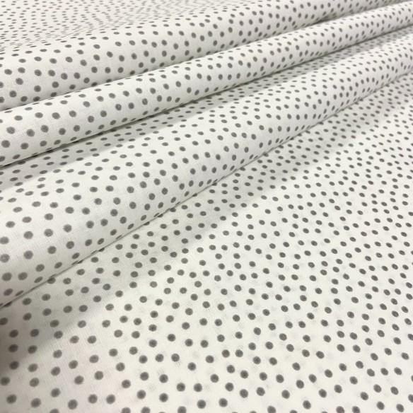 Tessuto di cotone - Puntini grigi sparsi su bianco
